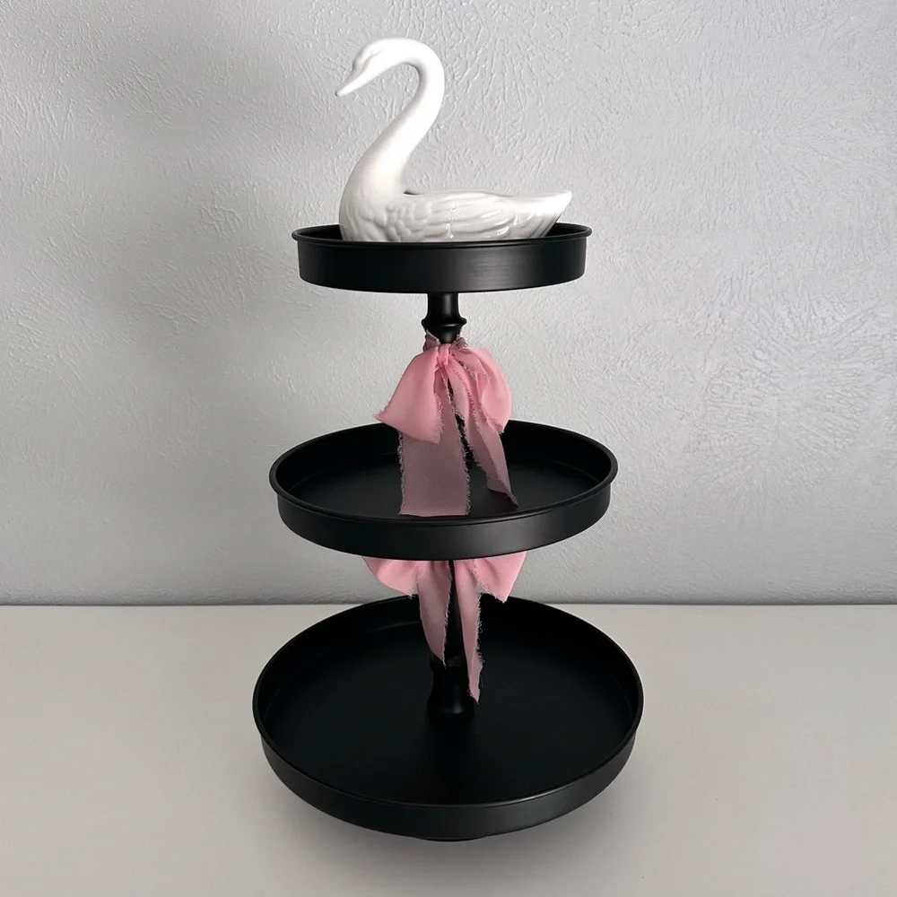 Black Three-Tiered Stand with Pink Silk Bow Accents